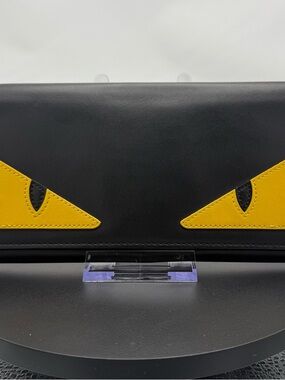 Fendi continental Monster wallet Black  with Yellow Eye Appliqués